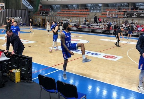 Former Coastal Carolina basketball star Ajay Sanders warms up before a game in Warsaw, Poland in April of 2023. Photo by David Driver